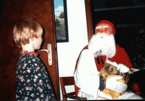 Nikolaus mit goldenem Buch Nikolaus spricht mit Kind